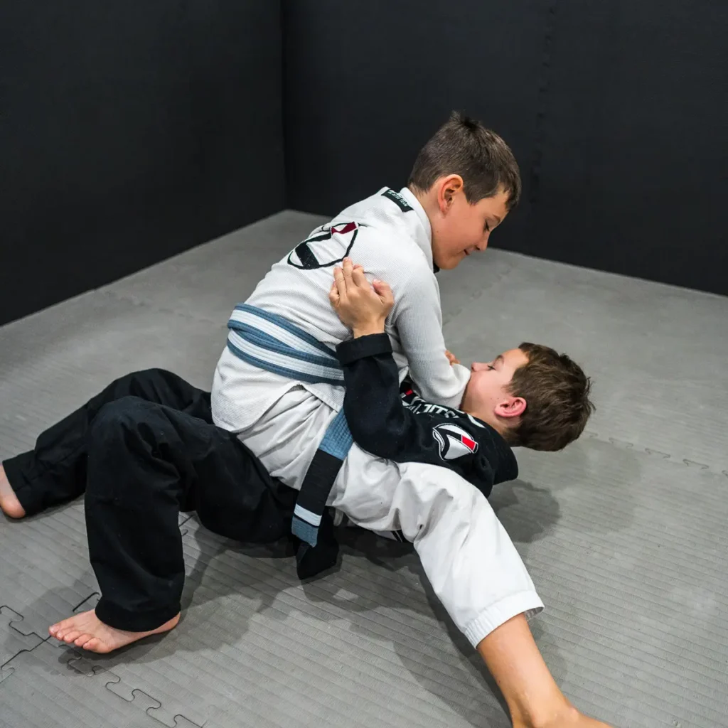Child practising Brazilian Jiu Jitsu at Lasco BJJ in Varsity Lakes, Gold Coast
