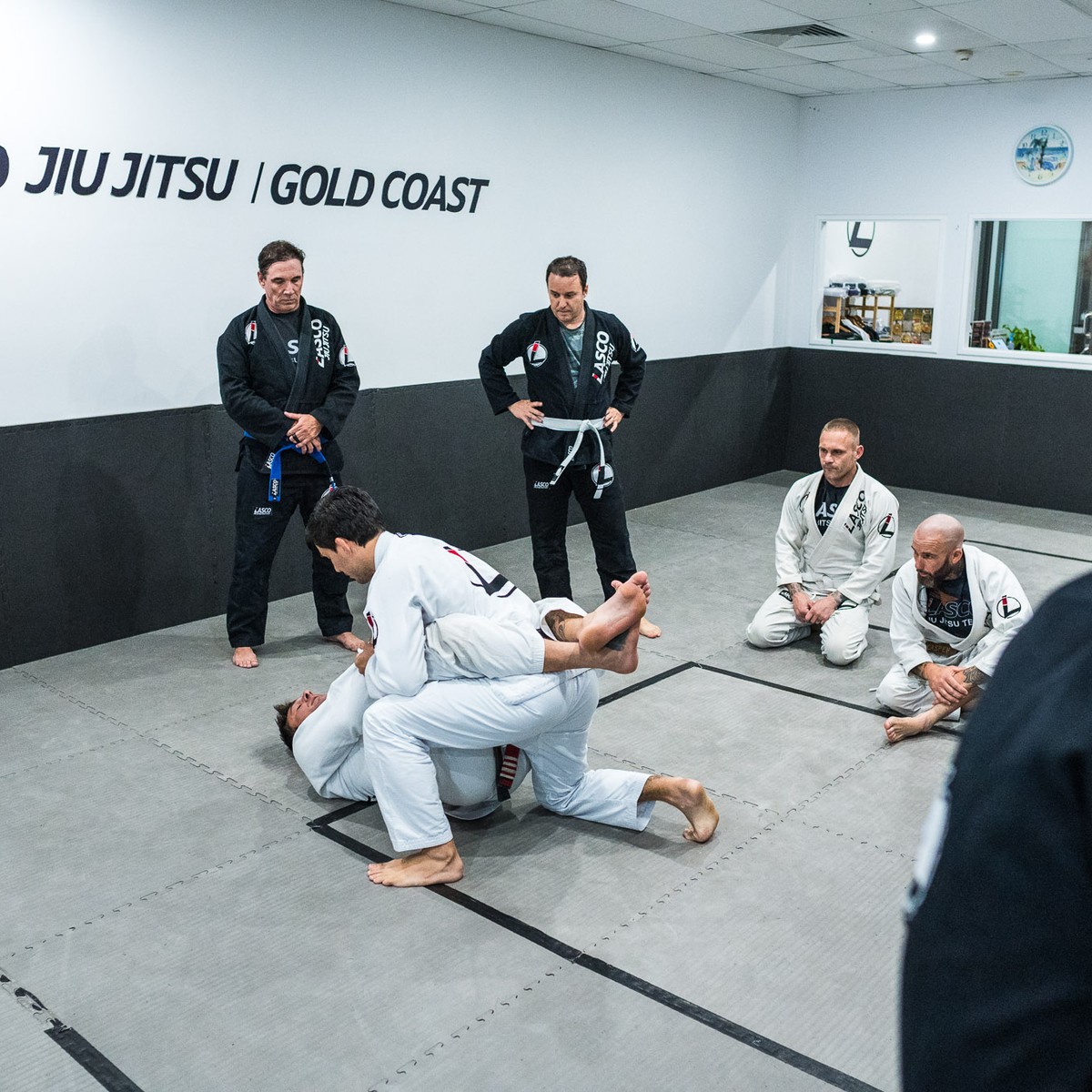 Lasco Jiu Jitsu students practising BJJ fundamentals during a coached class in Varsity Lakes